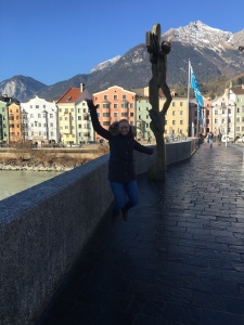 Jumping in Innsbruck, Austria with the impressive Alps in the back.